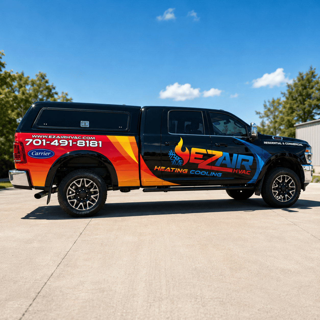 Gloss black vinyl wrap finish reflecting light on a wrapped pickup truck